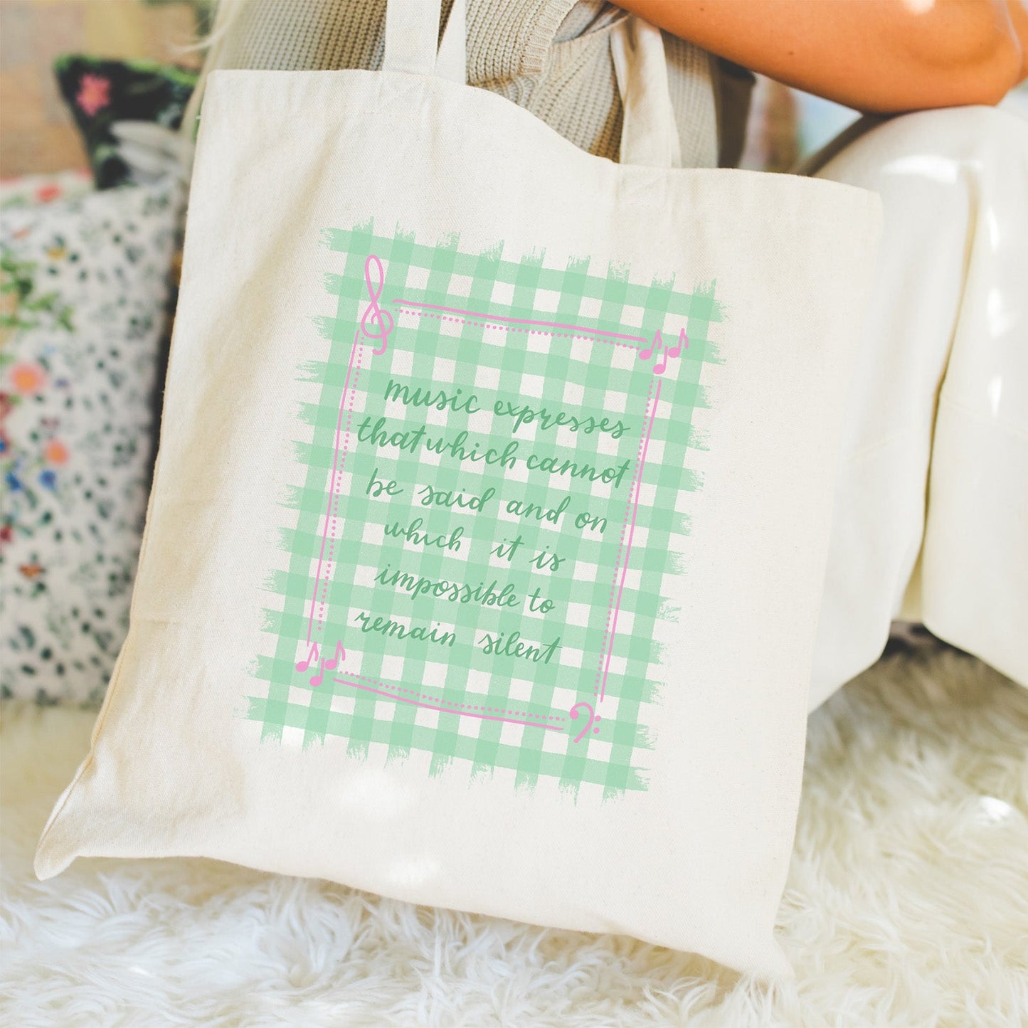 Music tote bag with the quote "music expresses that which cannot be said and on which it is impossible to remain silent."