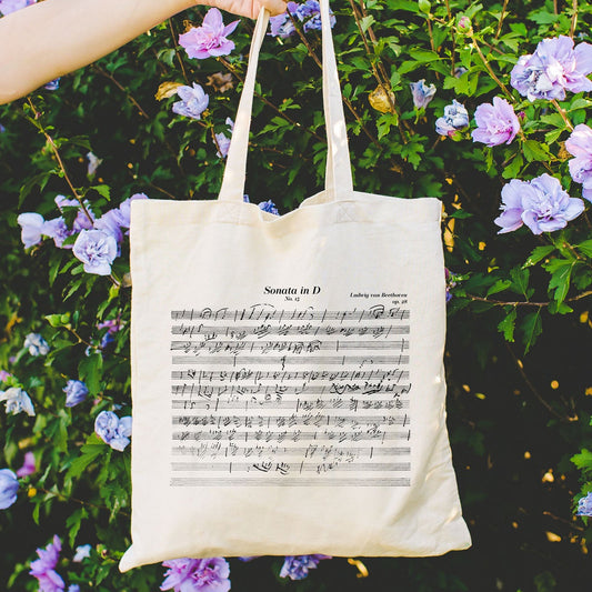tote bag with the sheet music to Beethoven's Piano Sonata in D printed on it.