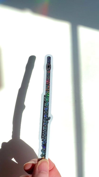 a video of a flute sticker sparkling in the sunlight